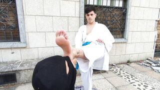 Karateka Boy Intimidates His Slave with Strong Feet and Silent Control